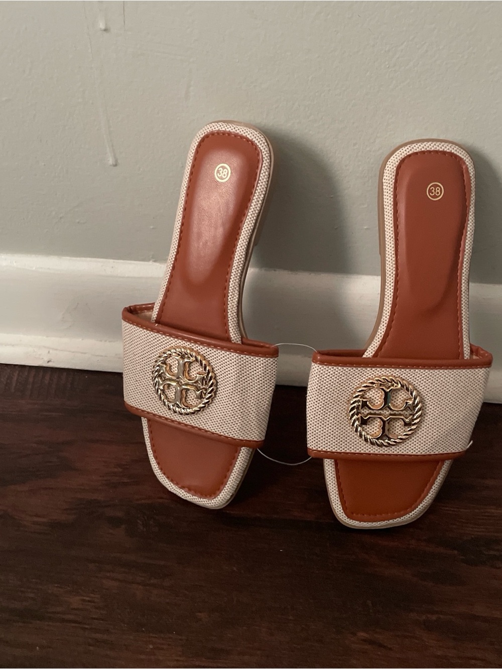 Tory Burch Tan & Cream Slide Mules with Gold Logo Medallion